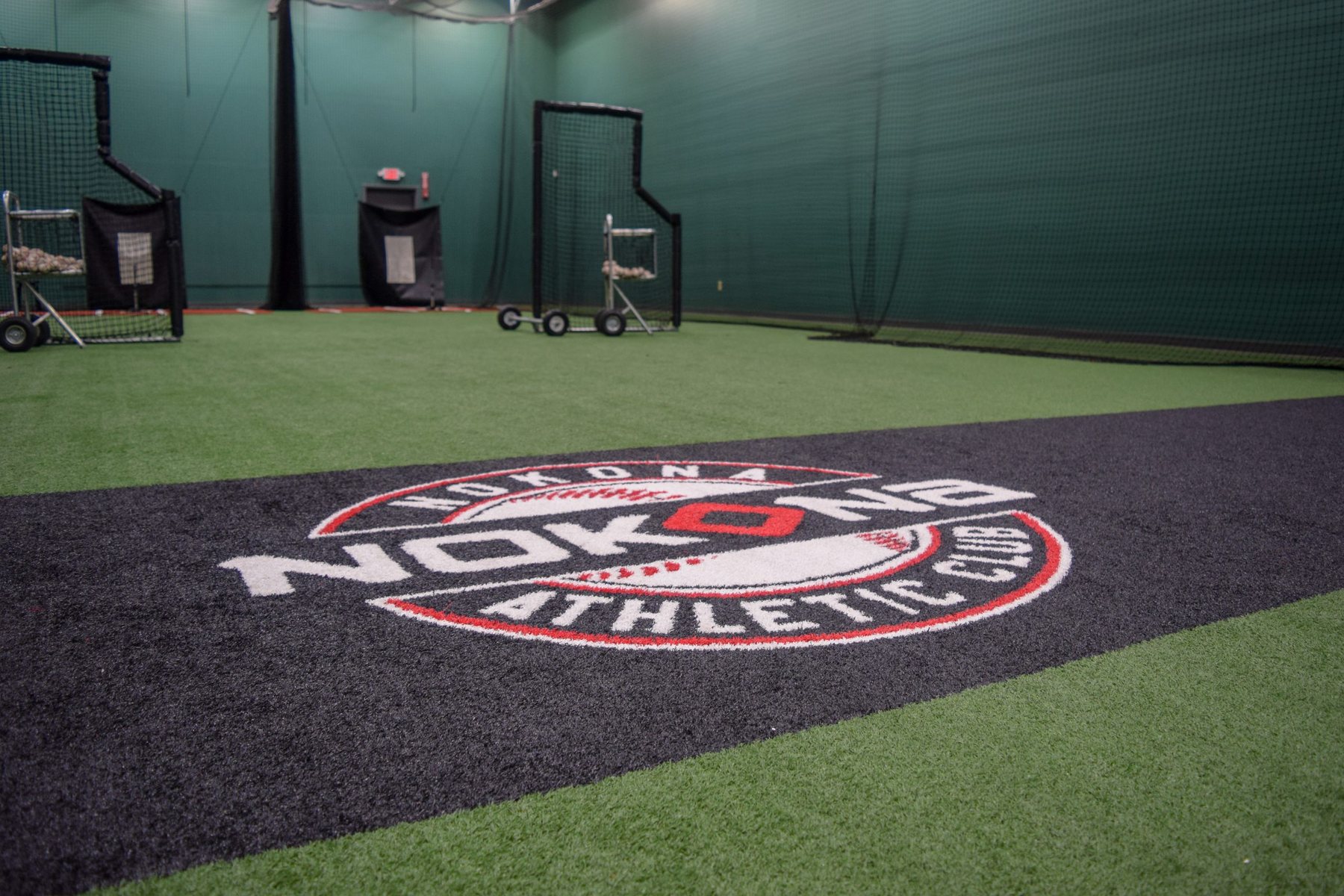 The Nokona Athletic Club logo on the turf at the NAC