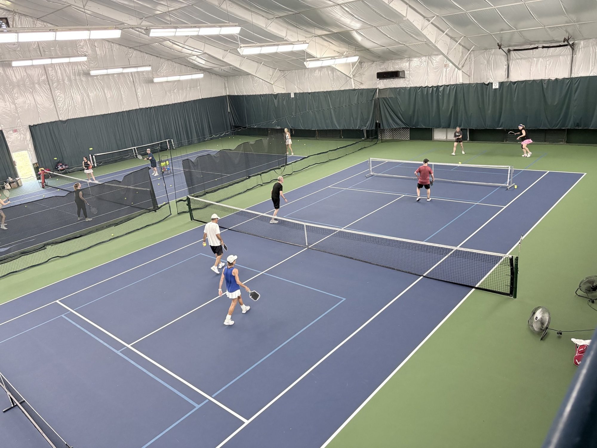 Doubles on the indoor courts at Tennis Frederick