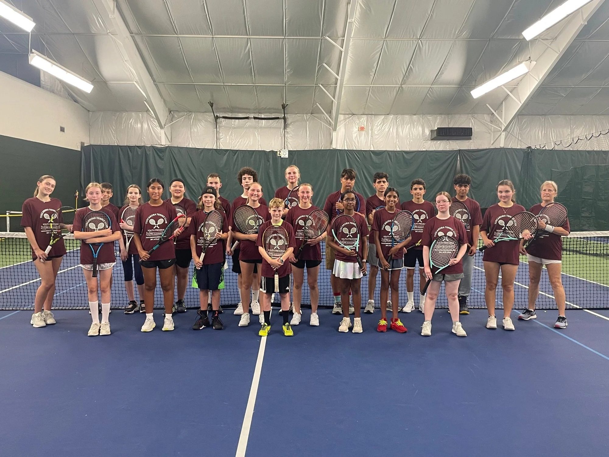 Junior players on court at Tennis Frederick